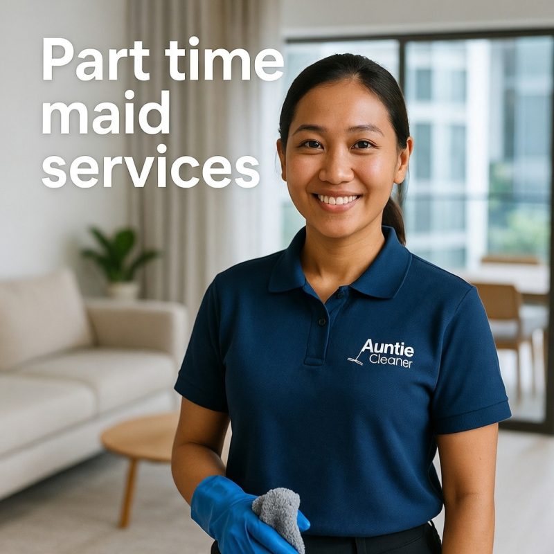 Smiling professional part-time maid from Auntie Cleaner wearing branded uniform, holding cleaning cloth and gloves in a modern Singapore home